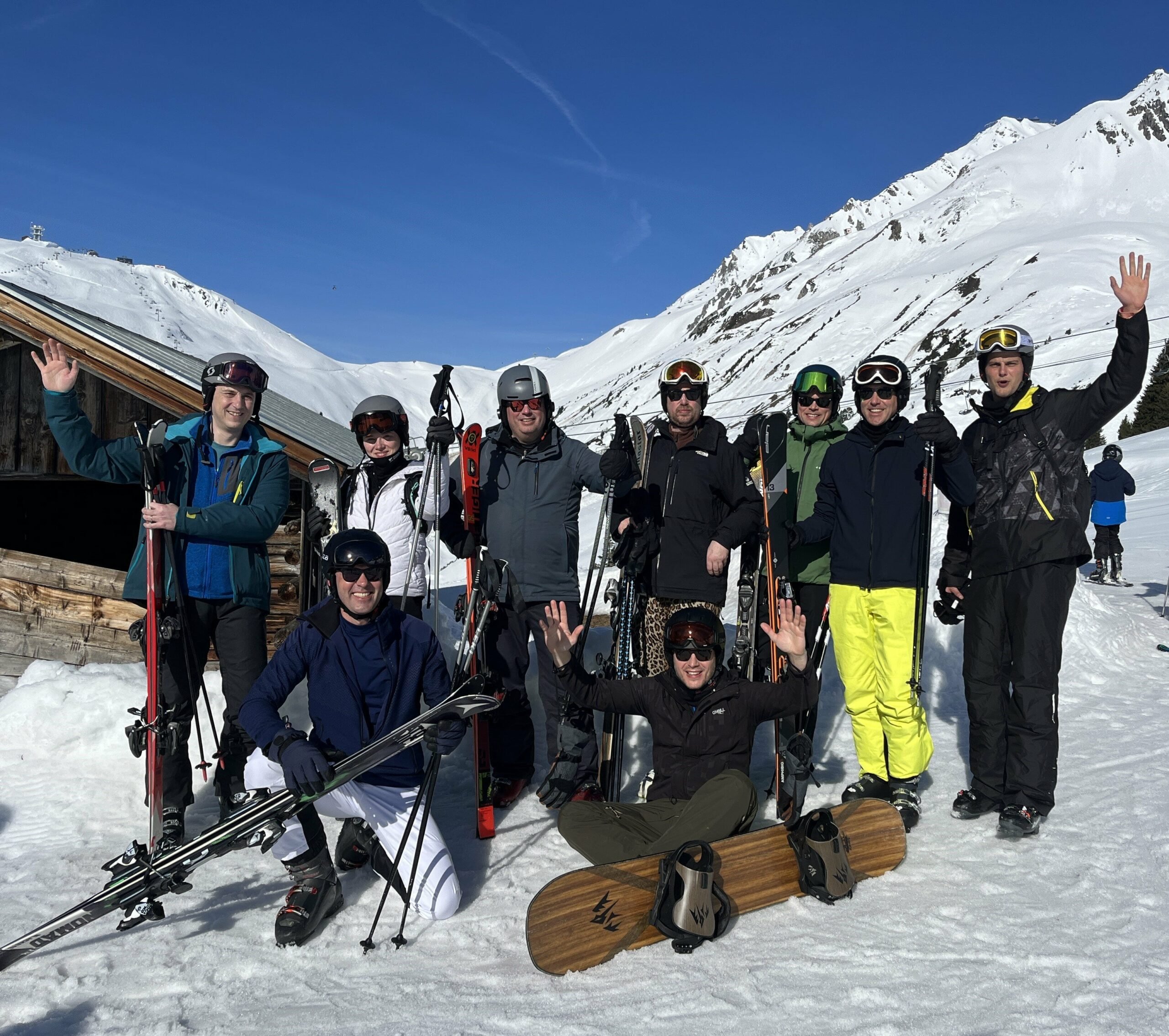 Group of TreasurUp team members enjoying a ski week in the picturesque snowy Alps, bonding over skiing adventures and team-building activities.